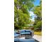 Inviting outdoor patio with comfortable seating, set against a serene lake view at 2538 Helmsman Rd, Johns Island, SC 29455