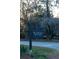 Kiawah River sign with lush foliage, offering an attractive sense of community at 2538 Helmsman Rd, Johns Island, SC 29455