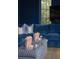 Blue-themed sitting room featuring a plush sectional sofa, a decorative table and comfortable seating at 2538 Helmsman Rd, Johns Island, SC 29455