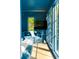 Comfortable sitting room featuring blue walls, large windows, and sectional seating at 2538 Helmsman Rd, Johns Island, SC 29455