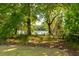 Scenic community path with view of grassy lawn and distant water at 2538 Helmsman Rd, Johns Island, SC 29455