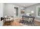 Serene home office with hardwood floors, neutral decor, and a bright window with a view of the outdoors at 301 Beaufort St, Summerville, SC 29483