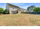 Large backyard featuring a covered patio and ample space for gardening, recreation, and enjoying outdoor living at 330 Albrighton Way, Moncks Corner, SC 29461
