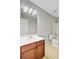 Bathroom features a single sink vanity, shower and tub combo, and tiled floors at 330 Albrighton Way, Moncks Corner, SC 29461