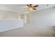 Spacious bonus room featuring neutral carpet and a ceiling fan at 330 Albrighton Way, Moncks Corner, SC 29461