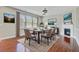 Stylish dining room featuring hardwood floors, a fireplace, and sophisticated decor at 330 Albrighton Way, Moncks Corner, SC 29461