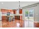 Bright kitchen featuring an island, stainless steel appliances, and sliding door access to the backyard at 330 Albrighton Way, Moncks Corner, SC 29461