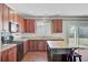 Functional kitchen featuring modern appliances, custom cabinets, and a convenient island at 330 Albrighton Way, Moncks Corner, SC 29461