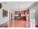An open kitchen featuring an island, stainless steel appliances, and sliding door access to the outdoors at 330 Albrighton Way, Moncks Corner, SC 29461
