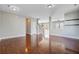 Spacious living room featuring hardwood floors and a seamless flow to the dining area at 330 Albrighton Way, Moncks Corner, SC 29461