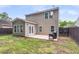 Spacious backyard with a patio, room for grilling, and a partially fenced in area for privacy at 3844 Annapolis Way, Ladson, SC 29456