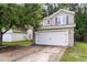 View of the home exterior with a two-car garage at 3844 Annapolis Way, Ladson, SC 29456