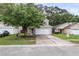 Charming two-story home with a two-car garage, well-maintained lawn, and mature landscaping in a suburban neighborhood at 3844 Annapolis Way, Ladson, SC 29456