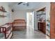 Comfortable bedroom featuring a crib, hardwood floors, and closet at 403 Forest Cir, Summerville, SC 29483