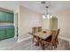 The Dining Room boasts natural light, hardwood floors, and space for hosting memorable gatherings at 403 Forest Cir, Summerville, SC 29483