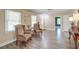 Bright living room featuring refinished hardwood floors and plenty of natural light at 403 Forest Cir, Summerville, SC 29483