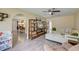 Open living room with a ceiling fan, and adjacent dining room, perfect for entertaining and relaxed living at 403 Forest Cir, Summerville, SC 29483