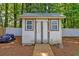 Backyard shed with double doors and a ramp at 403 Forest Cir, Summerville, SC 29483