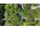 Overhead aerial view of the neighborhood with lush greenery and tree lined roads at 418 Lakeview Dr, Summerville, SC 29485