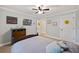 Bedroom featuring soft lighting, a comfortable bed, and tasteful decorative posters at 418 Lakeview Dr, Summerville, SC 29485