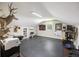 Spacious bonus room, ideal for recreation or hobbies, featuring neutral walls and ample natural light at 418 Lakeview Dr, Summerville, SC 29485
