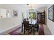 Traditional dining room with beautiful wood table set on a decorative area rug at 418 Lakeview Dr, Summerville, SC 29485