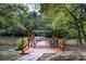 Picturesque dock featuring comfortable seating and serene waterfront views for relaxation and enjoyment at 418 Lakeview Dr, Summerville, SC 29485