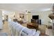 Open concept living room and kitchen space with hardwood floors at 418 Lakeview Dr, Summerville, SC 29485