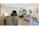 Open concept living room featuring a decorative fireplace and hardwood floors at 418 Lakeview Dr, Summerville, SC 29485