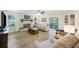 Bright living room featuring a decorative fireplace and a view of the patio at 418 Lakeview Dr, Summerville, SC 29485