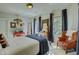 Charming bedroom featuring a cozy chair and windows that offer natural light at 418 W Carolina Ave, Summerville, SC 29483