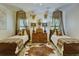 Bedroom featuring twin beds, unique lighting, and decor that complement each other at 418 W Carolina Ave, Summerville, SC 29483