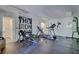 Spacious home gym featuring modern exercise equipment for a convenient workout experience at 418 W Carolina Ave, Summerville, SC 29483