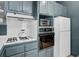 Kitchen featuring stainless steel appliances, built-in oven, gas range, and tile backsplash at 418 W Carolina Ave, Summerville, SC 29483