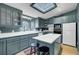 Kitchen featuring stainless steel appliances, gas range, built-in cabinets, and a skylight at 418 W Carolina Ave, Summerville, SC 29483