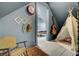 Whimsical playroom featuring a tent, guitar, playful decor, and natural light at 418 W Carolina Ave, Summerville, SC 29483