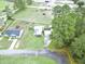 Aerial view of a home with a fenced yard and detached garage at 49 Auld Brass Rd, Walterboro, SC 29488