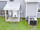 The backyard patio offers a space for outdoor relaxation and overlooks the backyard at 49 Auld Brass Rd, Walterboro, SC 29488