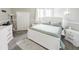Serene bedroom with white furniture, soft carpet, and natural light from the windows at 49 Auld Brass Rd, Walterboro, SC 29488