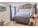 Cozy bedroom features comfortable furnishings, carpet flooring, and a TV for relaxation at 49 Auld Brass Rd, Walterboro, SC 29488