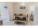 Cozy dining room with stylish furnishings and decor, plus abundant natural light from adjacent room at 49 Auld Brass Rd, Walterboro, SC 29488