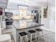 Bright kitchen with white cabinets, granite countertops, stainless steel appliances, and ample storage at 49 Auld Brass Rd, Walterboro, SC 29488