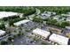 Aerial view of a commercial area featuring retail stores, large parking lot, and lush trees at 5022 W Liberty Meadows Dr, Summerville, SC 29485