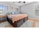 Bedroom featuring a fan, light grey walls, and hardwood flooring at 5022 W Liberty Meadows Dr, Summerville, SC 29485