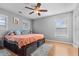 Bedroom featuring a fan, light grey walls, and hardwood flooring at 5022 W Liberty Meadows Dr, Summerville, SC 29485