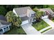 Well-maintained two-story home with neat landscaping, spacious driveway and inviting front porch at 5022 W Liberty Meadows Dr, Summerville, SC 29485
