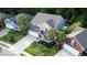 Two-story home featuring tidy landscaping, paved driveway and welcoming front porch at 5022 W Liberty Meadows Dr, Summerville, SC 29485