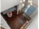 Inviting foyer with hardwood floors, a decorative chandelier, and a view of the front door and living spaces at 5022 W Liberty Meadows Dr, Summerville, SC 29485
