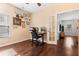 Functional home office with hardwood floors, perfect for remote work and focused tasks at 5022 W Liberty Meadows Dr, Summerville, SC 29485