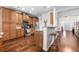 Well-appointed kitchen featuring stainless steel appliances, granite countertops, breakfast bar, and ample cabinet space at 5022 W Liberty Meadows Dr, Summerville, SC 29485